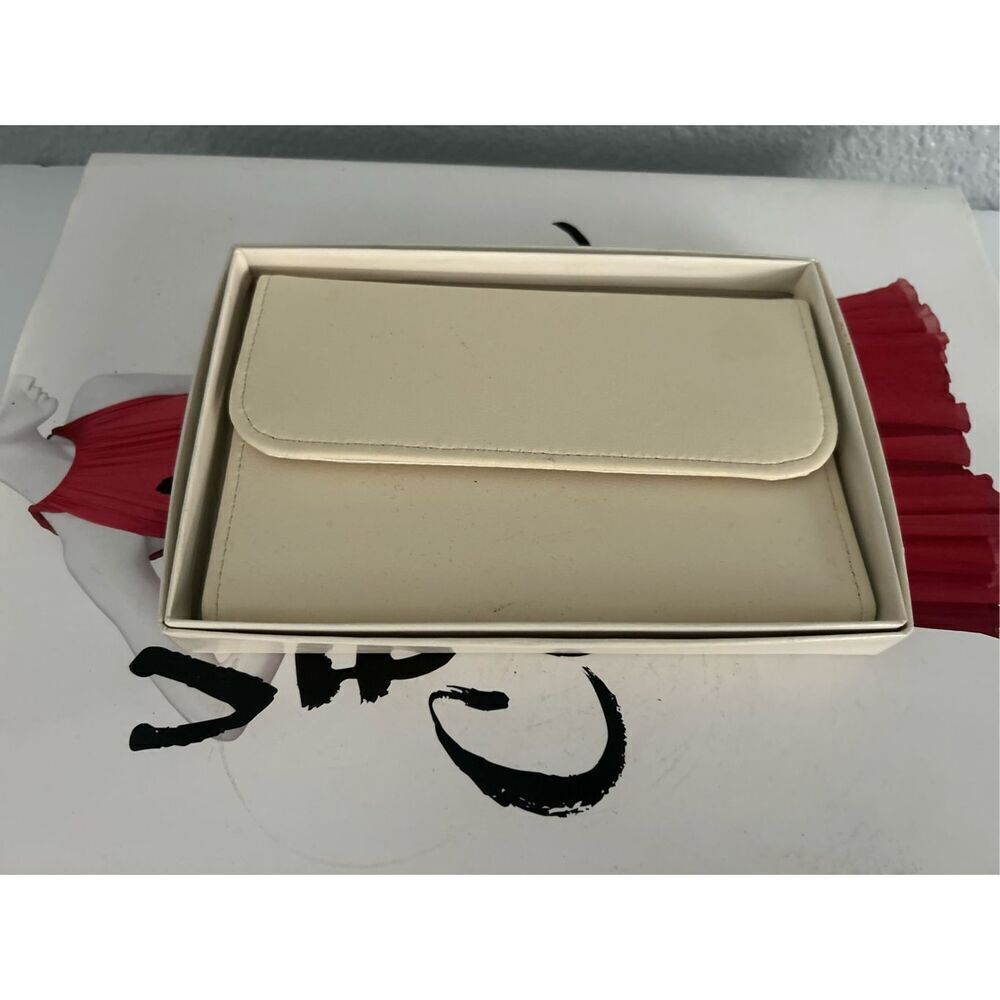 White Satin Jewelry holder , traveling, gifting. Leather outside new clean inclu